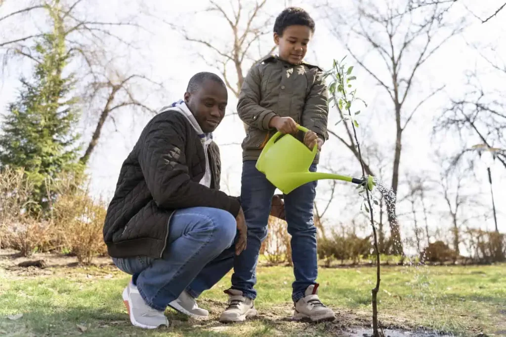 kid-learning-how-plant-tree